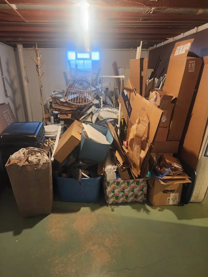 Roll-off dumpster container at job site for Yard Waste Dumpster Rental in Gadsden